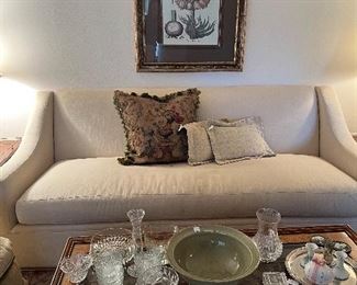 Custom Pearson sofa, large scale framed art, coffee table, beautiful cut glass and crystal in all shapes and sizes