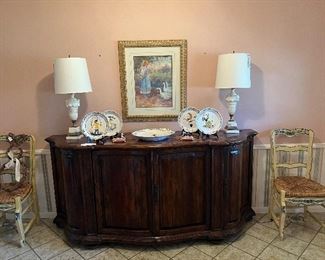 Antique console table, pair of Italian neoclassical marble lamps, framed print in beautiful pastels, collection of Nazari Portuguese plates, French chairs (a set of 6)