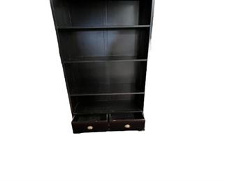 $170 USD      Large 3 Adjustable Shelf Black Bookcase w 2 Lower Drawers JC155-26     Description: Simplicity and storage define the sophisticated look of this double bookcase. Perfect for a study or den, its tall silhouette is statuesque and dramatic. Raised Panel finishing in black offers a versatile palette. Store and display books and decor accents on four tiers of shelving and two drawers.  Fill wall space while creating essential room for treasured volumes. Shelves are adjustable.
Dimensions:  44 x 17 x 79"H
Condition: Used with minor physical signs of wear associated with use and age.  Please refer to pictures for more detail.
Location: Local pick up SW Portland, OR. Location is easy access in warehouse. Contact us for shipper suggestions.      https://goodbyhello.com/products/copy-of-vertical-3-shelf-glass-front-single-door-storage-cabinet-jc155-25?_pos=14&_sid=44ad0c740&_ss=r
