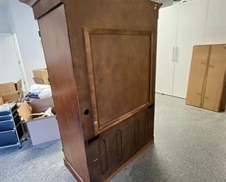 $600 USD      Armoire Media Center AH58-6     Description: Large Beautifully grained wood 2 door Armoire.  Perfect for extra storage, dry bar, wardrobe and/or media center. 2 electrical panels for 2 seperate interior power sources. 

Dimensions: 53 x 27.5 x 75H in

Condition: Very good condition with minor signs of wear appropriate with age and use.

Location: Local pick up SW Portland, OR.  Easy access from garage.  Shipping suggestions available upon request.     https://goodbyhello.com/products/copy-of-maitland-smith-round-leapord-coffee-table-w-glass-top-ah58-5?_pos=1&_sid=415700947&_ss=r