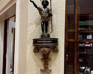 Metal statue and stand