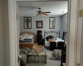 Beds and nightstands and the dressers and TV stands throughout