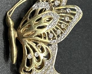 18kt Gold Diamond Butterfly Brooch Set with Fully
Cut diamonds Rhodium Plated Accents 
Total weight 10.15g

