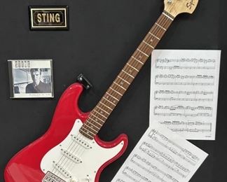 Sting (The Police) Autographed Electric Guitar
Framed in shadow box, under glass, with CD, Music Score, & Name Plaque