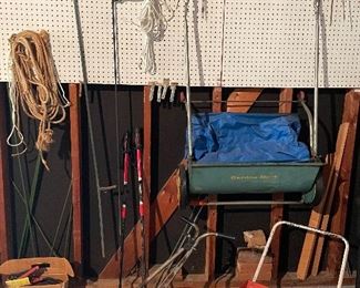 Vintage wheel barrow, spreaders, and walking sticks