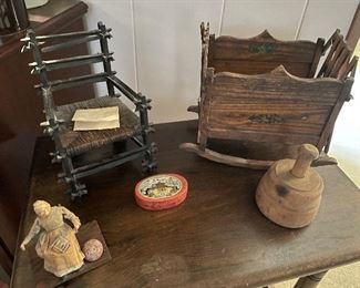 Primitive children's chair with a note, primitive toys, and butter press