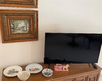 MCM low-profile media console, smaller TV, vintage pottery and framed prints