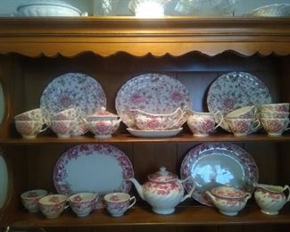Top row: Rose Chintz Pink (made in England stamp) by Johnson Brothers.  Bottom row:  Strawberry Fair Pink by Johnson Brothers