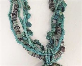25c - Blue medallion beaded necklace
