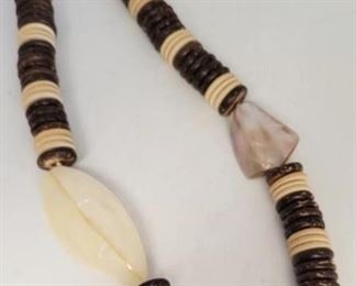 69c - Large brown / tan disc beads w/ abalone accents
