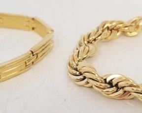 87c - 2 Gold tone bracelets
