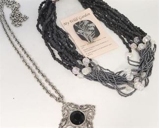98c - 2 Necklaces & broach
