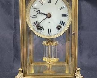 809 - Stunning Ansonia brass & glass cased clock Art Nuveau era mercury crystal pendulum, porcelain face 12 x 8 x 7
