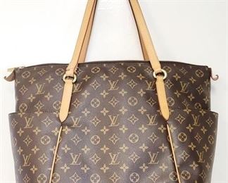 821 - Louis Vuitton large zipper tote handbag authentic, side pockets 13 x 18 damages noted in photos
