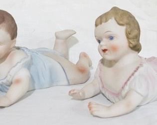 871 - Pair porcelain piano babies - 9 x 6
