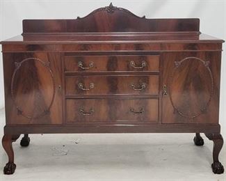 2059 - English Chippendale mahogany sideboard pull out wine cellaret drawer book matched mahogany lined silverware drawer ball & claw foot legs, carved backsplash left side pull missing teardrop 47 x 60 x 21.5

