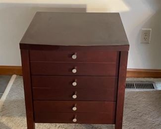 Solid wood storage end table. Perfect in living or bedroom.  Many drawers to hide items. 
