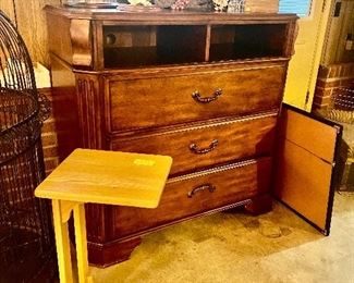 See the large glass cloche with wood base