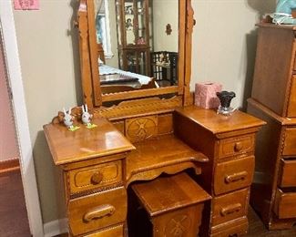 A complete set for this bedroom includes this sweet little dressing table with bench, chest of drawers, and queen bed, complete with Stearns and Foster mattress set. We will be selling each piece individually so you may buy what you like.