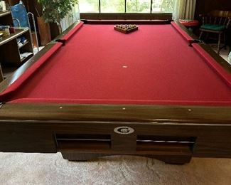 $1200 Gandy 9 foot pool table-3 piece slate.  Includes cue sticks/wall mount rack, balls and cover.  email gail@freshstarttransitions.com for more details.