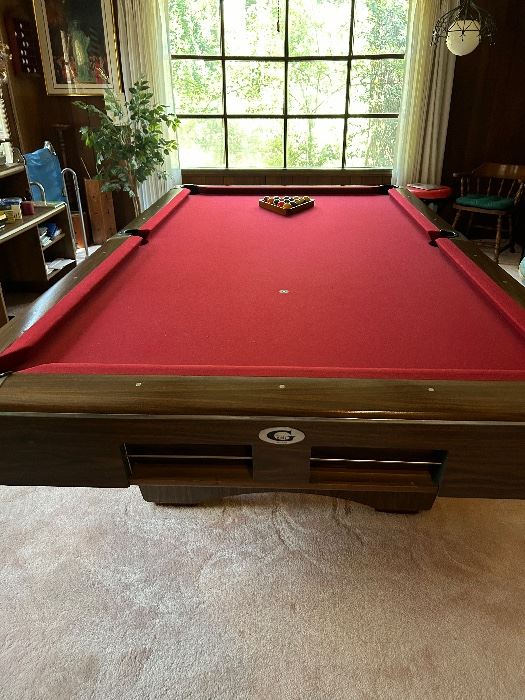 $1200 Gandy 9 foot pool table-3 piece slate.  Includes cue sticks/wall mount rack, balls and cover.  email gail@freshstarttransitions.com for more details.