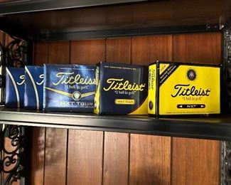 Full boxes of Titleist Golf Balls