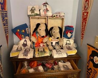 Vintage Snoopy dolls and many outfits. 