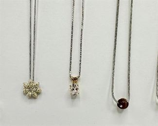 5 Necklaces Including Swarovski Crystal Flower & Smaller Stone Marked 925 Sterling
Lot #: 109