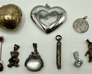 9 Sterling Silver Pendants & Charms, Marked 925 Or Sterling
Lot #: 10