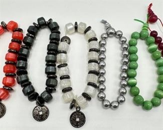 6 Beaded Bracelets, Some With Chinese Coin Charms
Lot #: 124