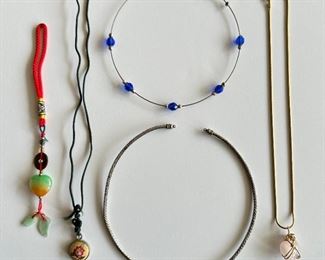 2 Chokers, 2 Necklaces Including Heart By Kenneth Jay Lane & Asian Charm
Lot #: 77