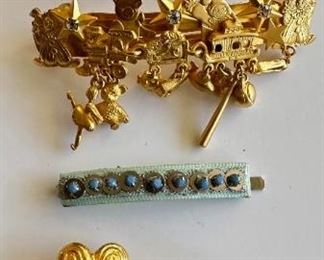 Gold Tone Buckle Belts, Barrette & Little Drummer Boy Pin By Acessocraft, Mimi Belt Buckles & Kirks Folley
Lot #: 114