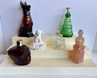 6 Vintage Avon Perfume Bottles With Tiered Stand
Lot #: 21