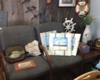 reception area seating, 2 attached chairs with side table $120. (2 available), lots of wall art