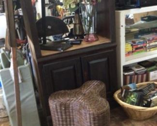 Entertainment center $59., wicker stool $30