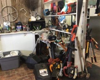 power tools, 2 chain saws, blowers, weed eaters, Rockwell Jawhorse workstation $120.,