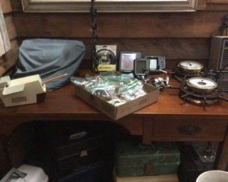 Lures, desk, typewriter, tackle boxes