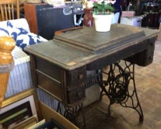 Vintage Singer trundle sewing machine in cabinet, frames