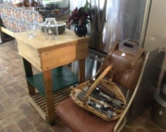 rolling butcher block table $75., chair, utensils 