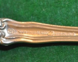 Westmoreland Sterling with an "H" and a Ram Head