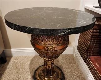 Oscar Bach German 1884-1957, gilt bronze nude men resting a metal spherical framed holding a Steuben gold aureen globe, glass 