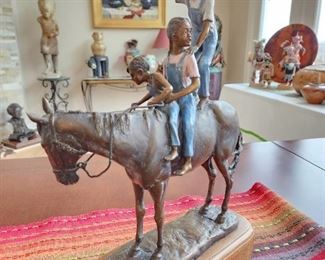 Bronze sculpture "Babysitter" by Vic Kopycinski