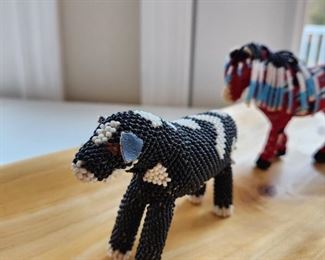 Black and white fully beaded "Cow" by Mabel Ghahate