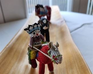 Fully beaded doll on horse by Effa Boone