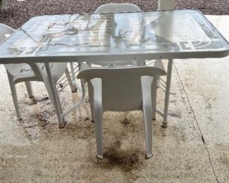 PATIO TABLE, 3 RUBBERMAID CHAIRS - BIRD BATH IN BACKGROUND WILL BE AVAILABLE FOR SALE