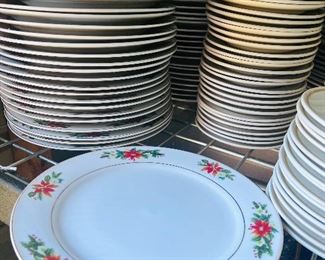 Approximately 100 poinsettia plates