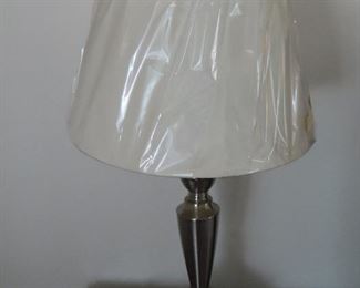 One of two matching table lamps.