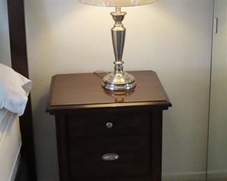 Two of two matching nightstands and table lamps.