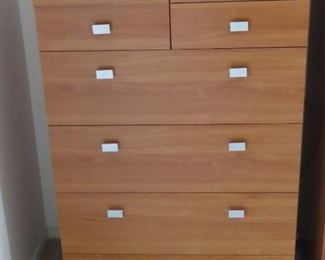One of two matching 8 drawer chests.