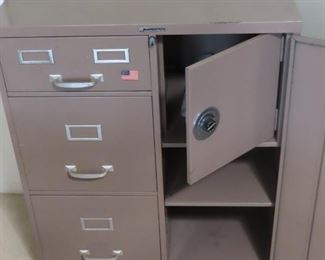 Locking file cabinet with locking safe box.